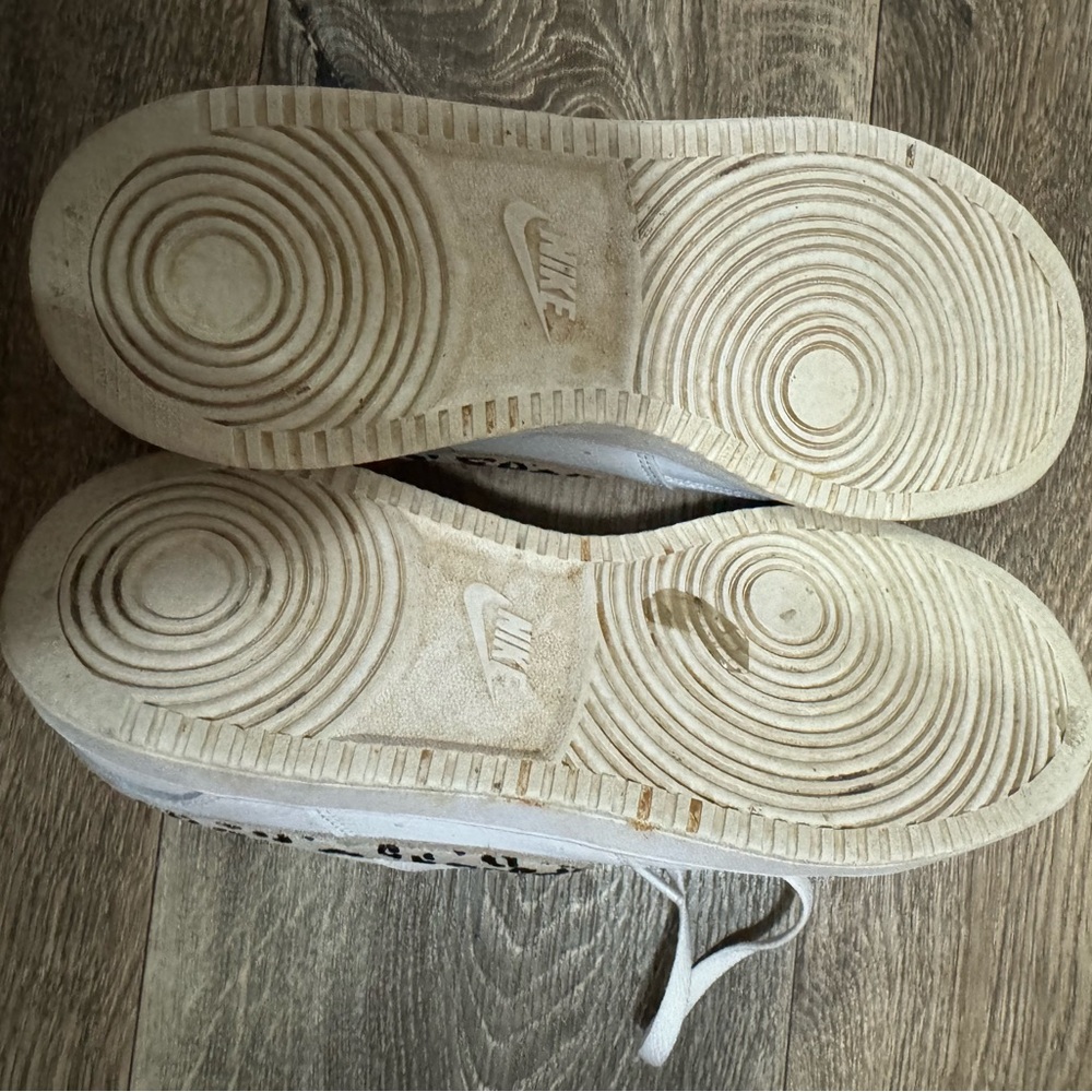 Authentic Nike Shoes. Well loved but will clean up easily.